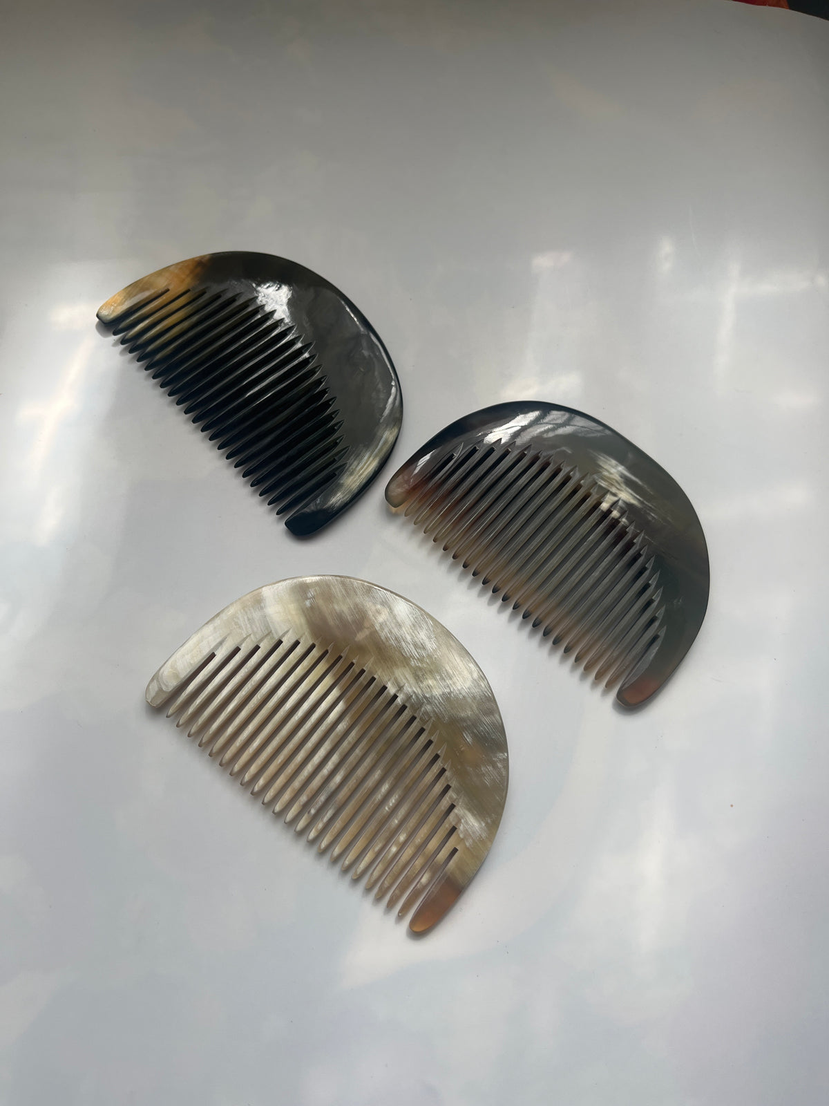 Handmade Buffalo Horn Pocket Comb — Natural 3.75" x 2.5" Half‑Moon Comb (Black & Brown)