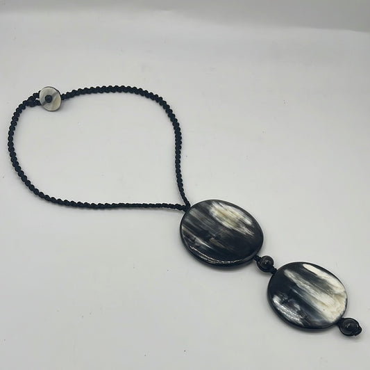 Two Round Polished Horn Pendant on Macrame Cord