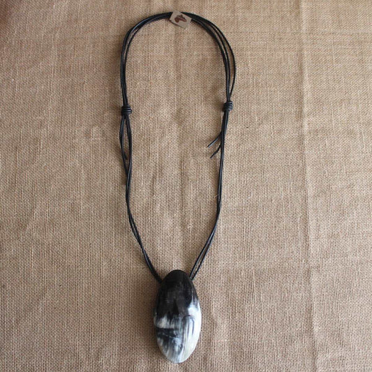 Oval Horn Pendant on Leather Cord