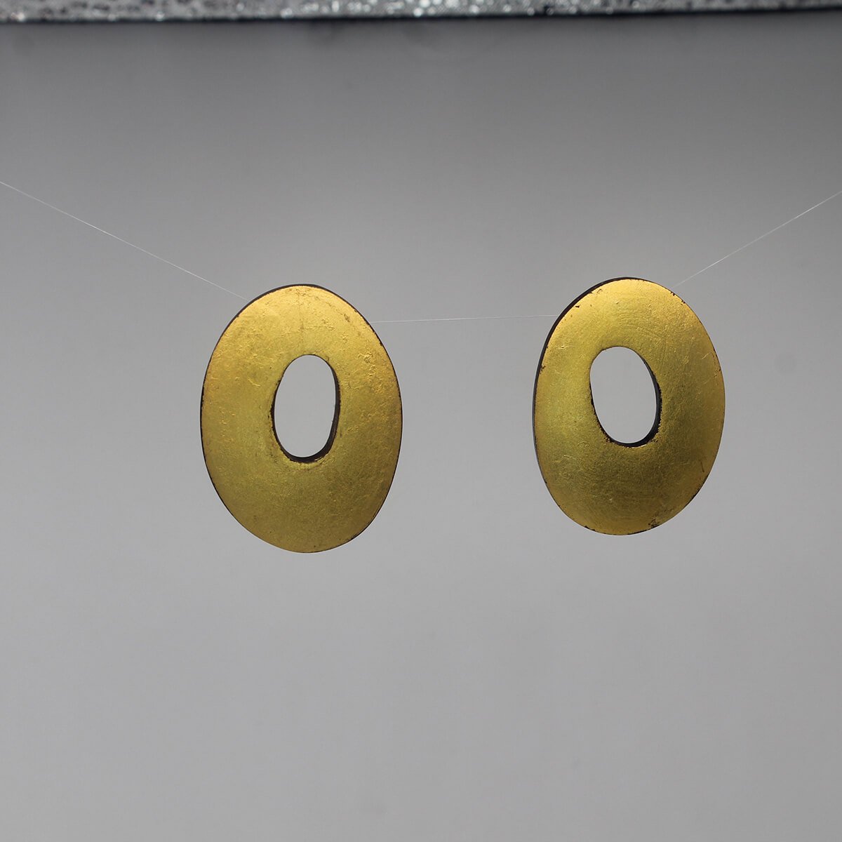 Oval cut out Earring